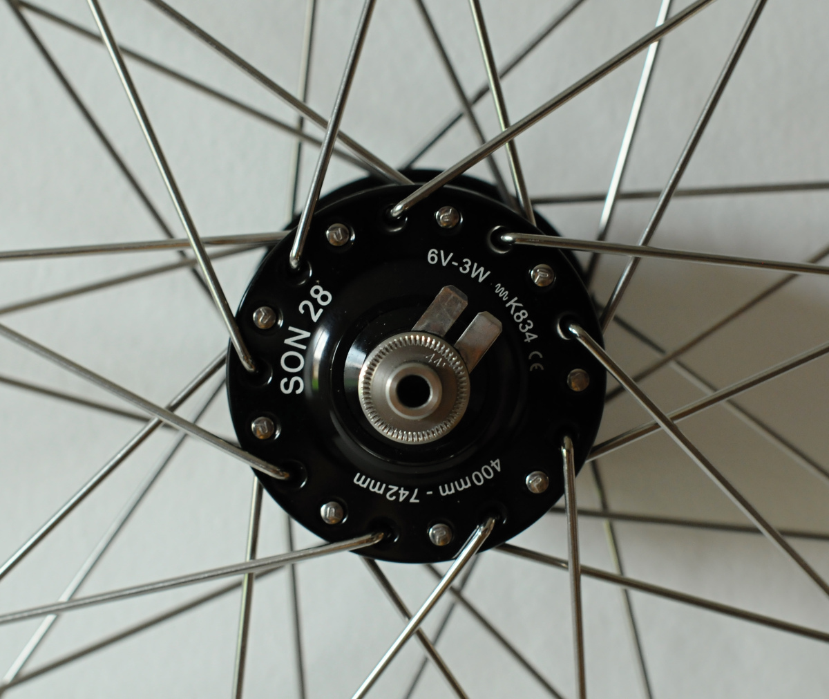 Remerx Jumbo 26" + dynamo SON28 - zapletený ráfek