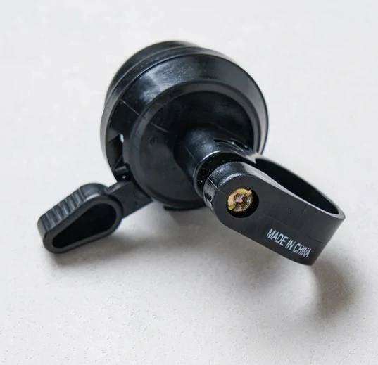 Cyklistický zvonek s vnitřním mechanismem